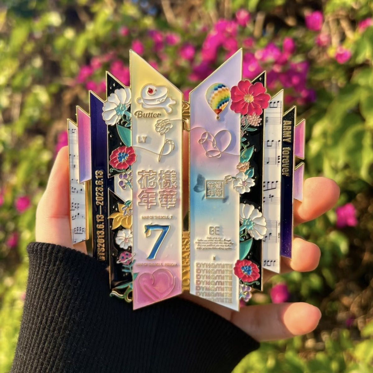 BTS 10th Anniversary Jumbo Enamel Pin Held in Hand Outdoor