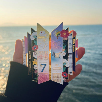 BTS 10th Anniversary Enamel Pin Displayed at Sunset Ocean Beach