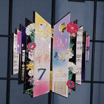 Front View of BTS 10th Anniversary Timeline Logo Enamel Pin