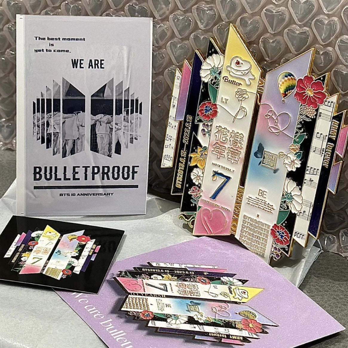 BTS 10th Anniversary Pin Displayed with BTS Proof Album Merch