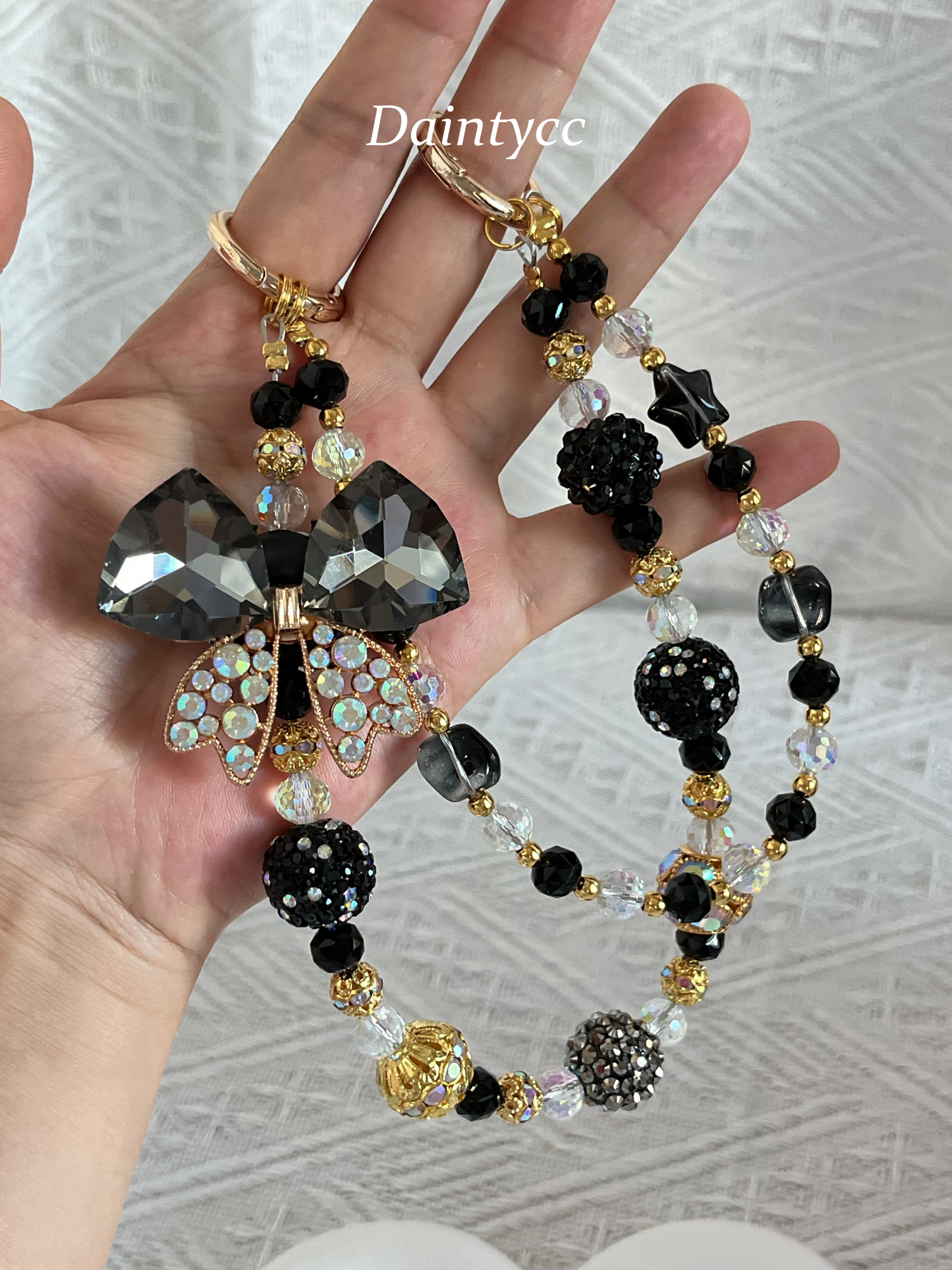 Elegant bow in black and gold combination Luxurious bag charm phone chain double chain