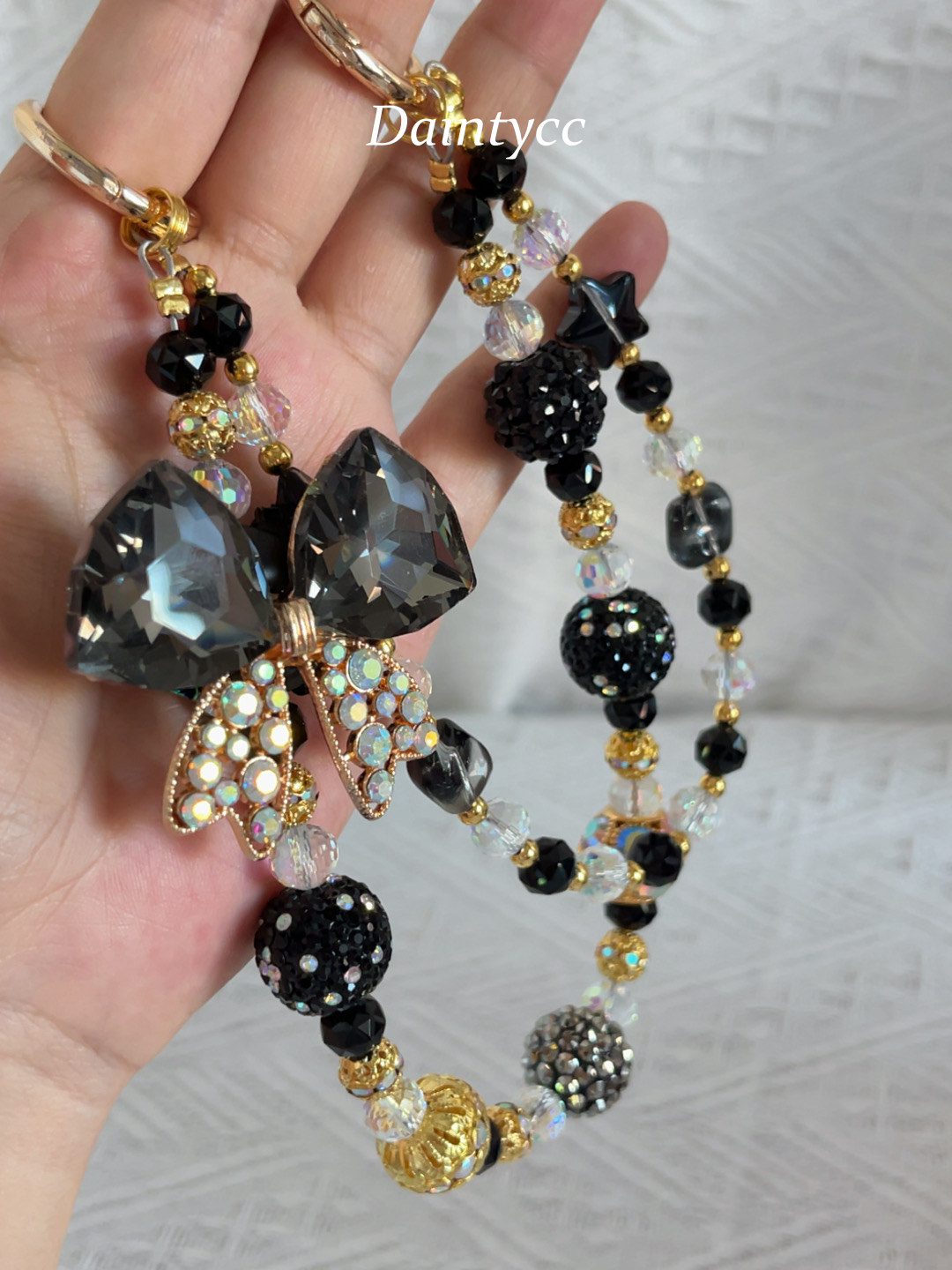 Elegant bow in black and gold combination Luxurious bag charm phone chain double chain